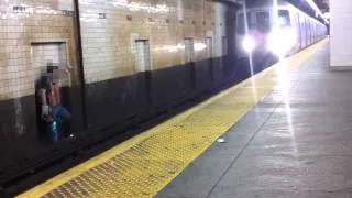 New York Subway Employee on the tracks when the train pulls in!!