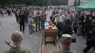 Hundreds take part in funeral of Ukrainian soldier who fought in the battle for Andriivka