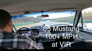 Ford mustang fastback 1965 v8 side exit exhaust flying by at wide open throttle 100+MPH at Track day