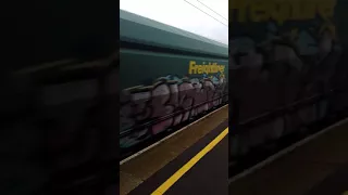 A freightliner coming through Stowmarket train station