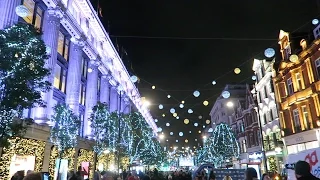 Рождественские огни в Лондоне Оксфорд-стрит включен