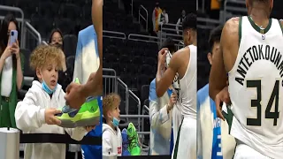 Giannis Give Her Sneakers Shoes and Jersey to his fans after the Game of Bucks and Nets