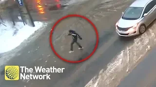 RAW VIDEO of elderly Montreal man slipping in freezing rain, nearly hit by car and lays motionless