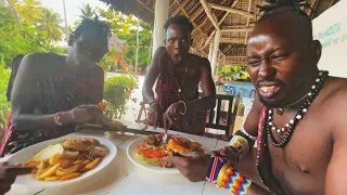 African Tribe tries Burger for the first time