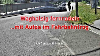 Waghalsig fernradeln – mit Autos im Fahrbahntrog