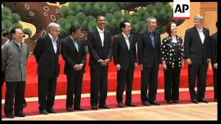 Leaders forgo traditional dress for group photo