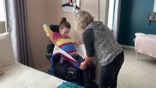 How to use a ceiling lift to transfer a patient from a wheelchair to bed