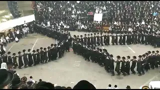 Boys dancing by the Sheva Bruchos of the Rabbi grandchild in New Square