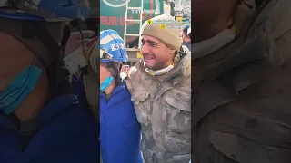 Emotional Chinese rescuers and Turkish soldier exchange hugs amid rubble