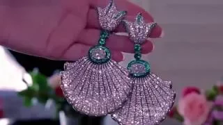 De Grisogono earrings from new Haute Joaillerie collection with diamonds, emeralds, in titanium.