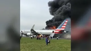 Plane catches fire on O'Hare Airport runway