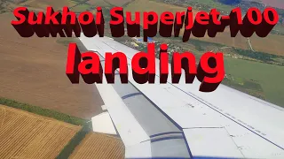 Beautiful landing on the Sukhoi Superjet-100 with a wing view. Wing and flap operation.