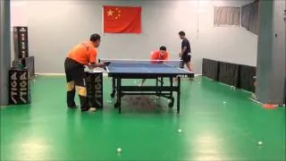 Ma Long doing multiball with head coach Liu Guoliang