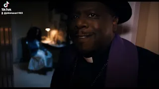 A haunted house funny priest scene