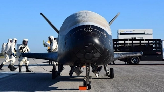 Secret Air Force space plane returns to Earth