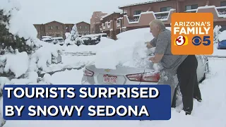 Tourists surprised by snow in Sedona