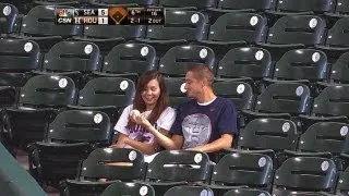 Fan makes catch to save girlfriend from foul ball