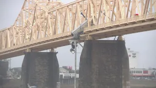 Semi truck hangs off Clark Memorial Bridge in Louisville; driver rescued