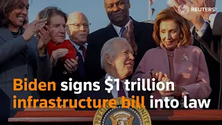 Biden signs $1 trillion infrastructure bill into law