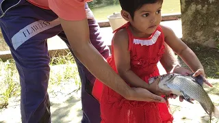 Cute Little girl catching fish for the first time | Assamese girl of India catching big fish