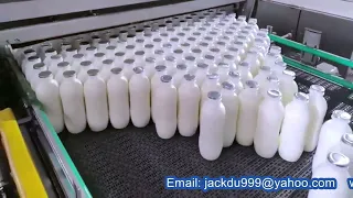 Milk bottles all water sterilizing autoclave inline with carton packaging line
