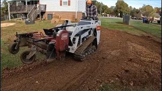 Harley Raking after trees were removed