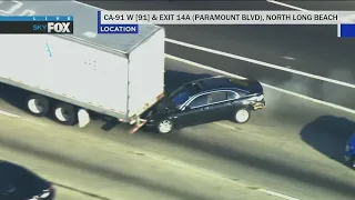 Pursuit vehicle crashes into back of big rig on 91 Freeway after hour-long pursuit