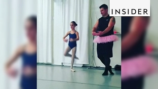 A group of dads joined their daughters for a ballet class