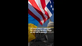 US lawmakers rebuked for waving Ukraine flags as aid bill is passed | AJ #shorts