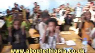 Ethiopian school children singing "Heads shoulders knees and Toes"