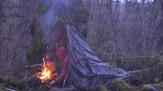 SOLO CAMPING in RAINSTORM in HOT SHELTER under a rock