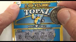 Scratching an Instant Scratch Off Lottery Ticket called "Topaz 7s" -  Australian Lotteries