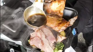 British Sunday Roast of Beef Cooked and Tasted in London. Street Food of Brick Lane