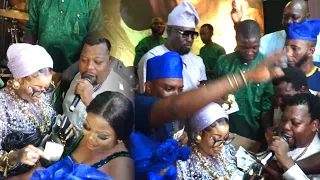 LIZZY ANJORIN AND HER HUSBAND SHUTDOWN STAGE AS THEY RAIN MONEY ON SHAI AT HER TWINS NAMING CEREMONY