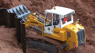 Trucks caterpillar and excavators working hard RC live action at the Construction World Part 48