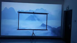 Comparison of the projector on the white wall and the screen on the screen!