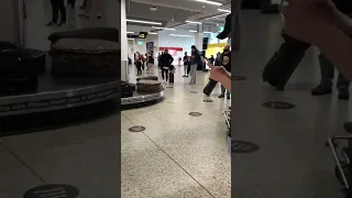 Luggages Fall off Crowded Baggage Carousel #shorts