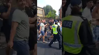 Tottenham firm escorted past a Chelsea pub