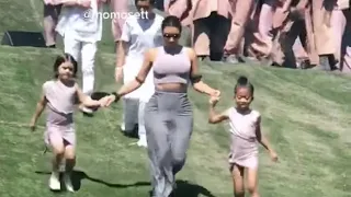 Kim Kardashian Running Down A Hill With Children while Kanye performs At Sunday Service In Coachella