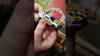 Unboxing a hot wheels 2005 Ford Mustang.