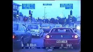 UK Police chase a speeding Ferrari on highway