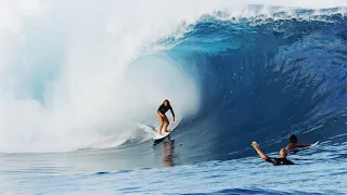 Young Girl Surfs Massive Teahupo'o, Tahiti