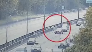 shocking footage: two demented insane women run in front of oncoming traffic on motorway