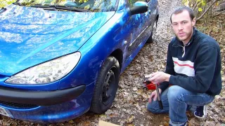 How to change brake rotors and pads on a Peugeot 206