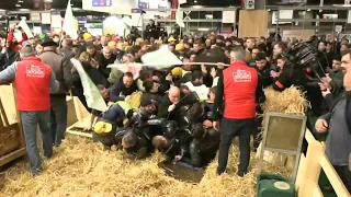 Protesters force entry, clash with law enforcement at Paris agriculture fair | AFP