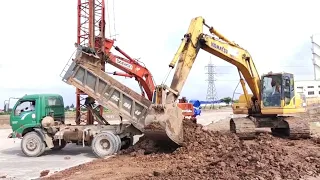 "The excavator is scooping dirt from the truck." part 2 #viral #excavator