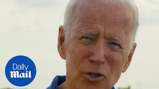 'She pulled ME close!' Biden jokes about his touchiness at NH rally