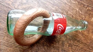 Impossible ring through glass  bottle