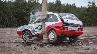 A rally-prepared roll cage fights the light pole