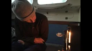 DIY Sailing: Cubic Mini Cub wood stove aboard a small sailboat.